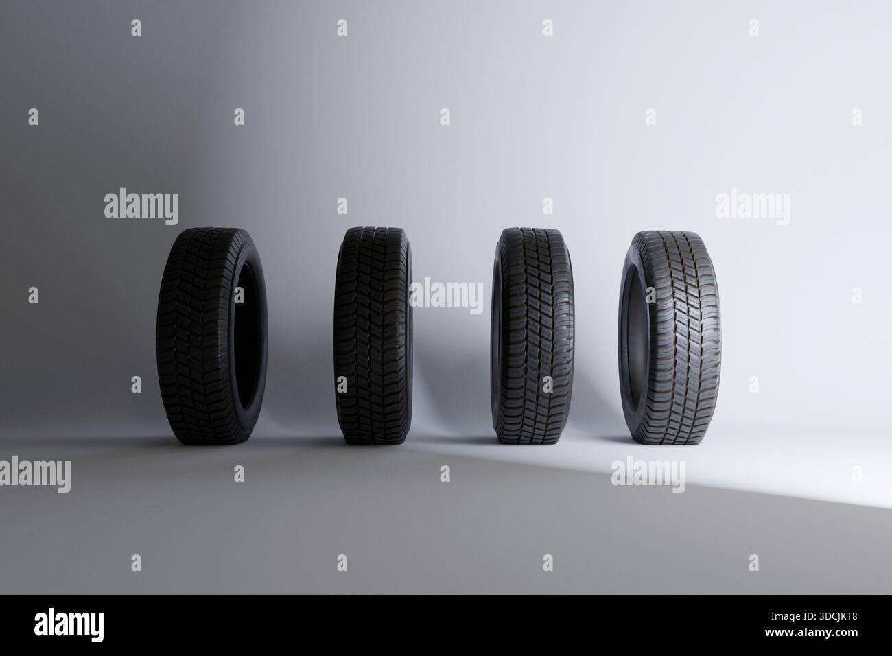 Quatre pneus d'une roue de voiture sur un fond blanc. Remplacement des pneus d'hiver neufs. Sécurité et contrôle, concept Banque D'Images