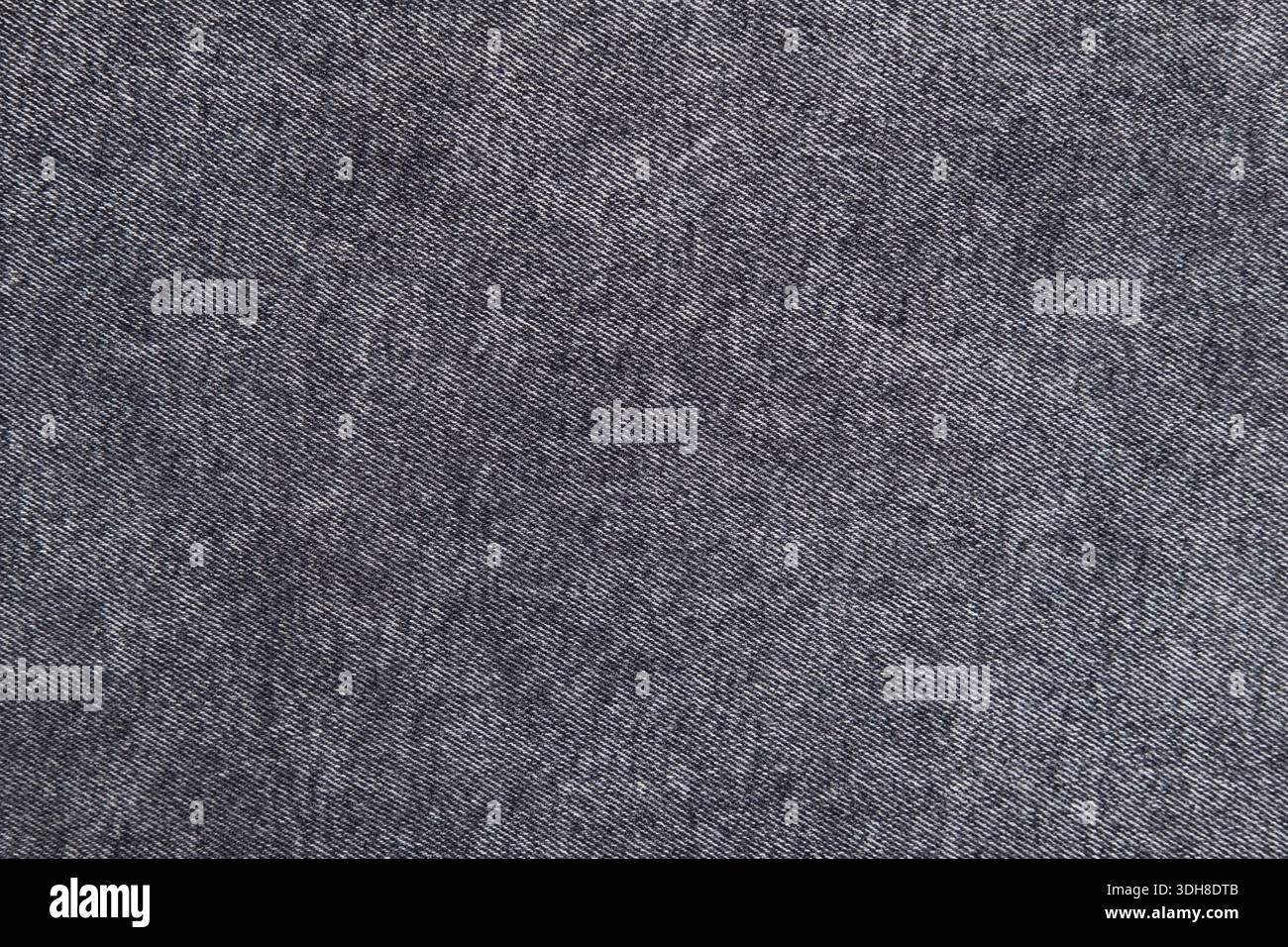 fond de tissu denim gris gros plan. Banque D'Images
