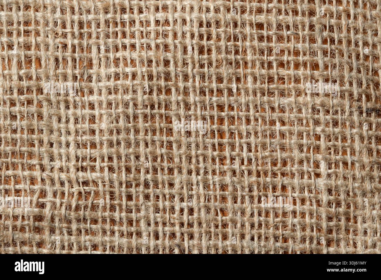 La vue rapprochée met en valeur le magnifique tissage du tissu en toile de jute, soulignant ses détails. Banque D'Images