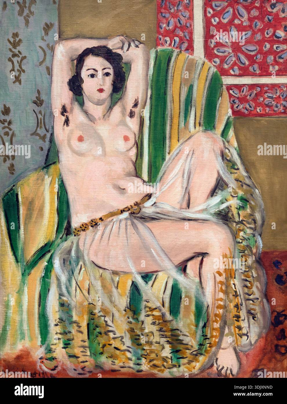 Odalisque assis les bras levés, chaise à rayures vertes, Henri Matisse, 1923 Banque D'Images