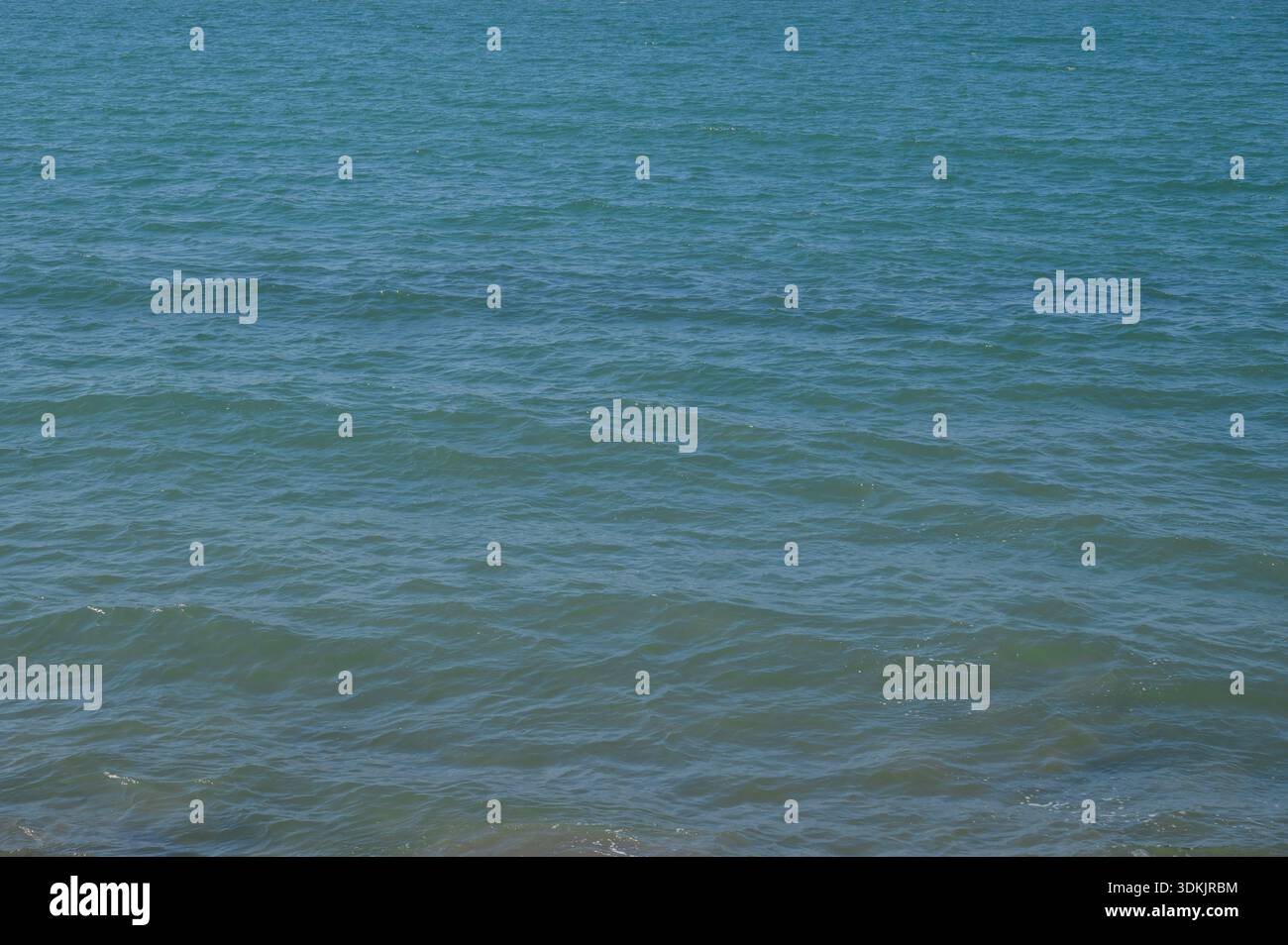 Photo de fond de mer. Océan Pacifique lisse de couleur bleue. Banque D'Images