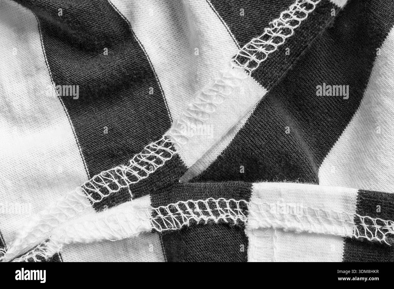 Points sur tissu coton rayé noir et blanc gros plan Banque D'Images