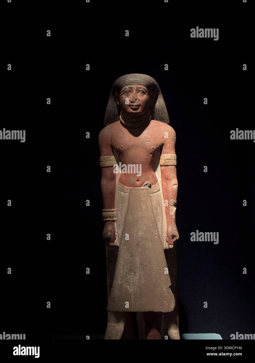 Statue d'un homme dans un pagne, Nouveau Royaume, Musée de Louxor, Louxor, Egypte. Banque D'Images