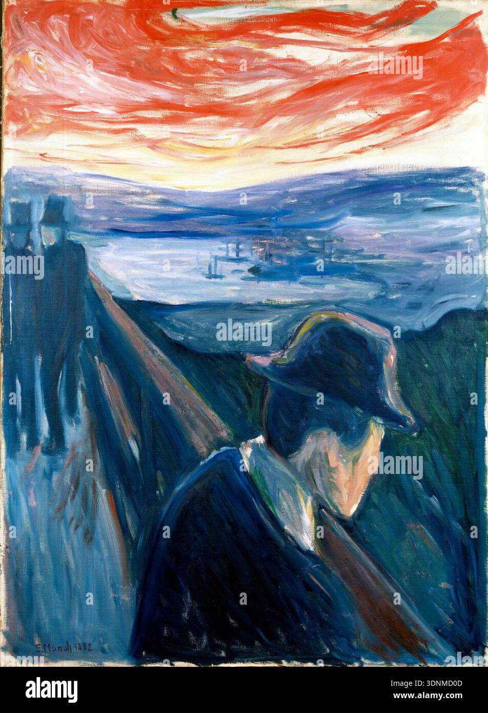 Cette peinture expressionniste de 1892, intitulée « désespoir » par Edvard Munch, représente une figure solitaire regardant loin du spectateur, surplombant un fjord avec un ciel rouge et orange dramatique. L'intensité émotionnelle véhiculée par des couleurs vives et des coups de pinceau tourbillonnants est caractéristique des premières œuvres de Munch. Banque D'Images