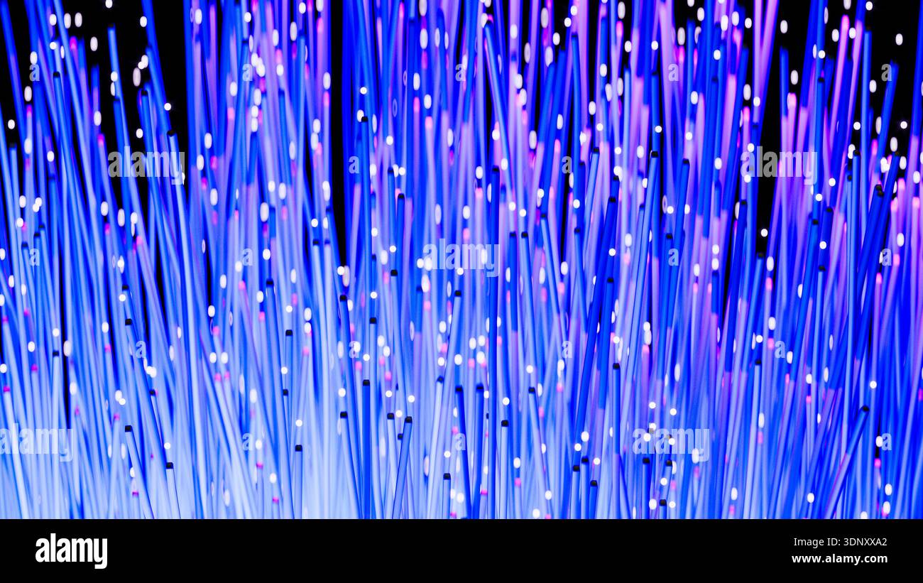 La scène présente des fibres technologiques dynamiques dans des tons lumineux de bleu et de violet, créant un arrière-plan visuellement magnifique et abstrait. Banque D'Images