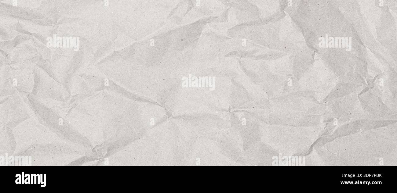 Papier blanc froissé présentant une texture de surface froissée et pliée Banque D'Images