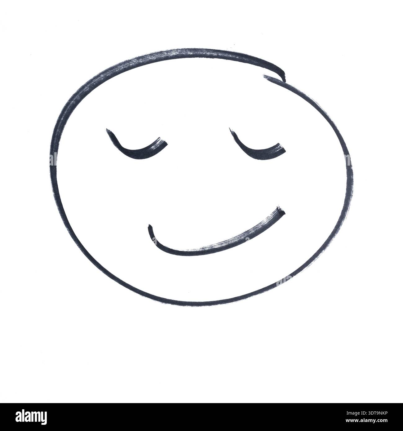 dessin d'un visage avec une expression souriante faite avec un marqueur noir sur une surface transparente Banque D'Images