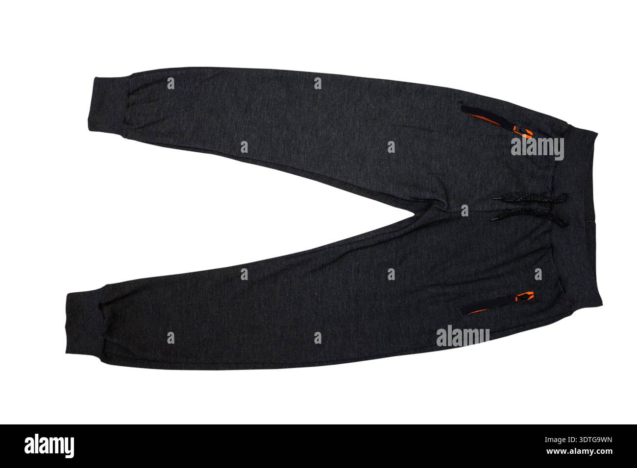 pantalon de sport gris foncé pour garçon isolé sur fond blanc Banque D'Images