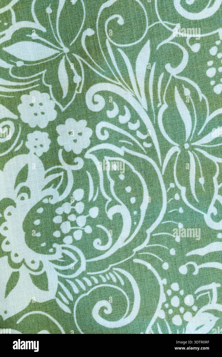 Motif de tissu de défilement de fleur en vert et blanc. Matière élégante en coton Banque D'Images