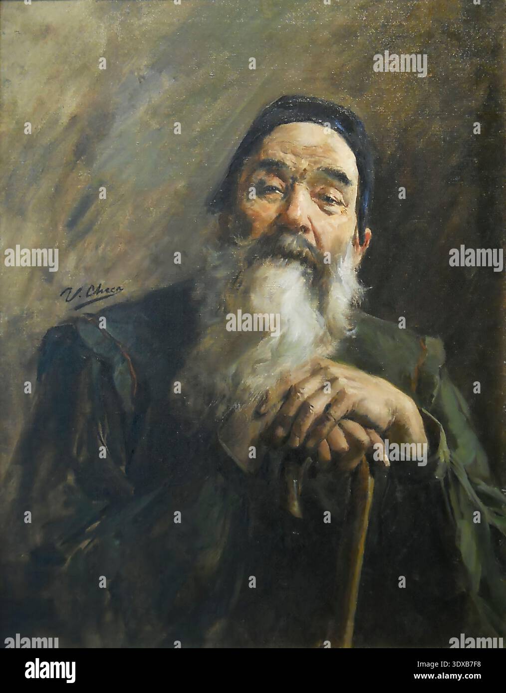 Vieil homme avec une longue barbe blanche et un bonnet sombre regardant directement, reposant ses mains serrées sur un bâton de marche, représentant l'âge, la sagesse et le passage du temps. Ulpiano Fernández-Checa y Sanz (3 avril 1860 – 5 janvier 1916), connu sous le nom d'Ulpiano Checa, est un peintre, sculpteur, concepteur d'affiches et illustrateur espagnol. Il utilise des techniques impressionnistes et académiques, et peint principalement des sujets historiques. Banque D'Images