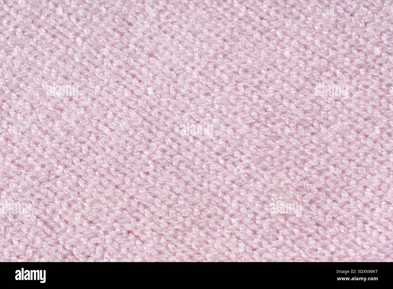 Macro de texture de tissu doux rose. Banque D'Images