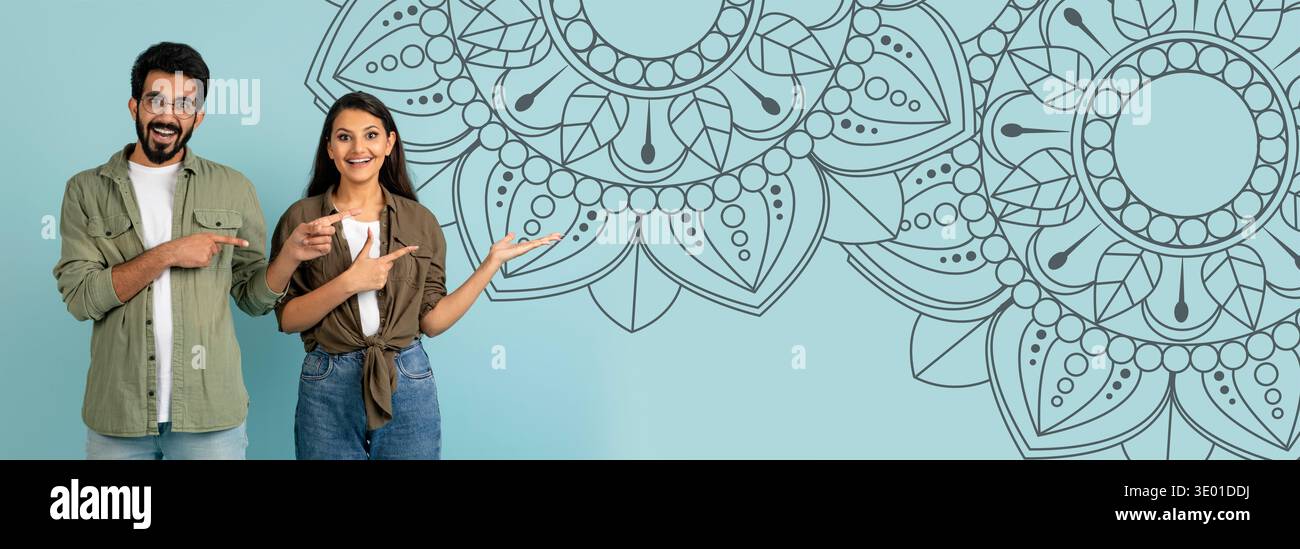 Collage de personnes pointant vers une fresque murale décorative dans un cadre intérieur lumineux Banque D'Images