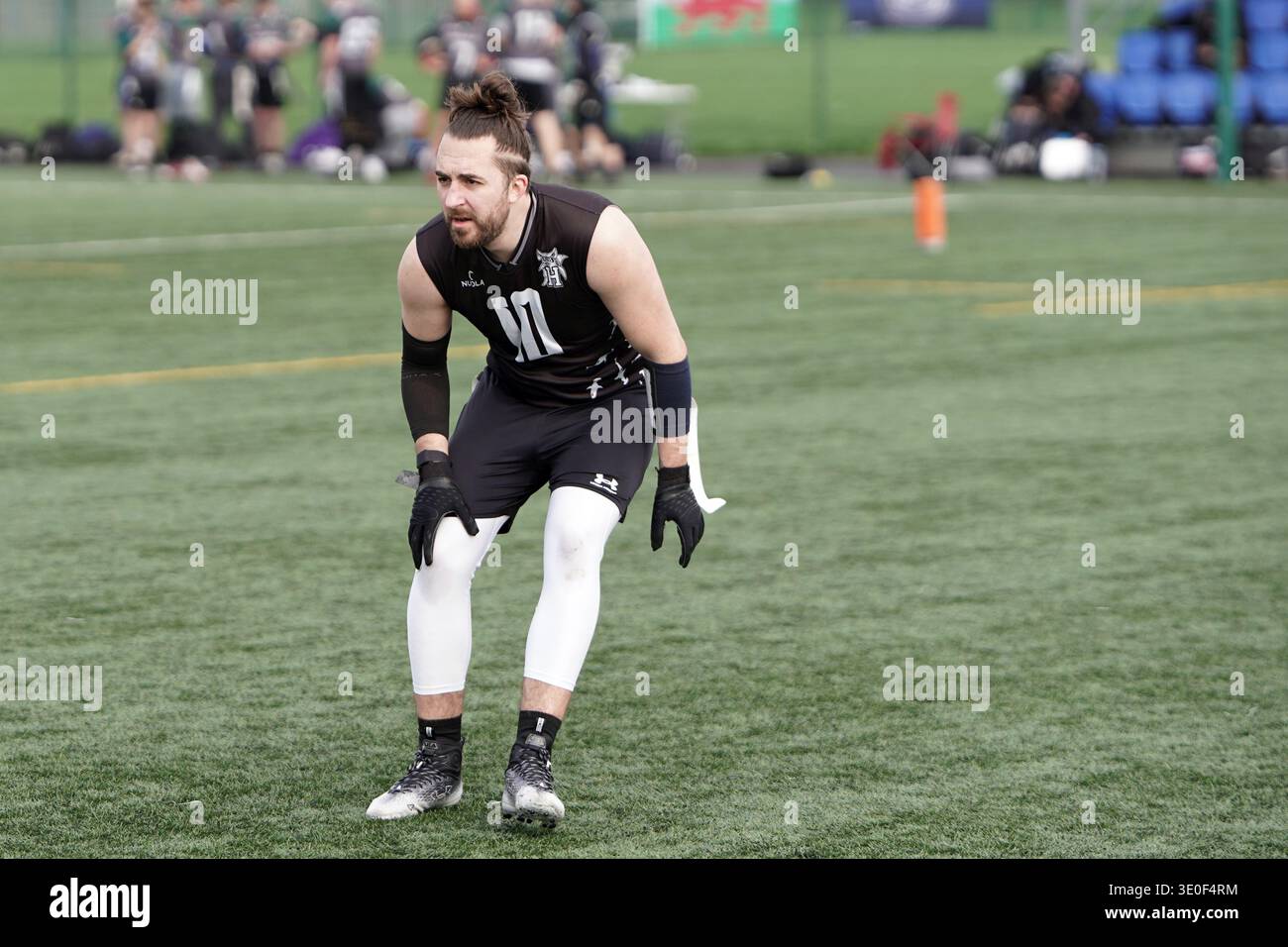 Drapeau joueurs de football se précipitant dans le Welsh Bowl VI Banque D'Images