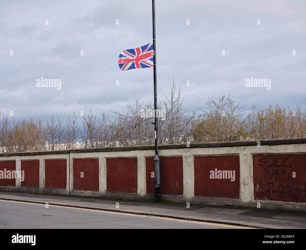 Un drapeau union Jack accroché à un lampadaire à Ha Banque D'Images