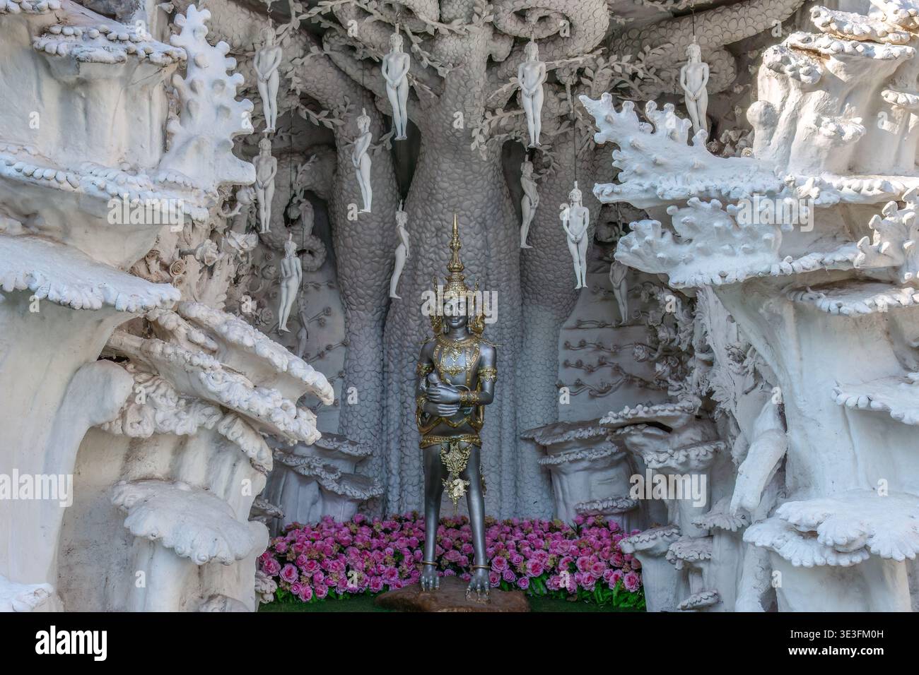 Scène au temple bouddhiste de Bangkok, dépeignant l'histoire mythique de l'arbre à maïs. Banque D'Images