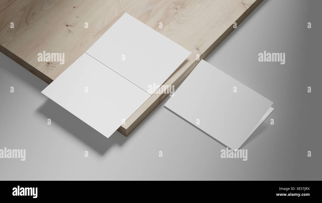 Maquette de brochure pliée bi sur fond de bois clair avec texture de papier blanc, composition moderne et espace négatif, idéal pour la marque et l'edito Banque D'Images