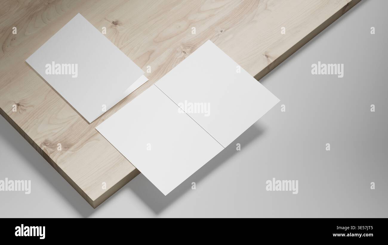 Maquette de brochure pliée bi sur fond de bois clair avec texture de papier blanc, ombres douces et espace négatif, idéal pour l'identité d'entreprise et le presen Banque D'Images