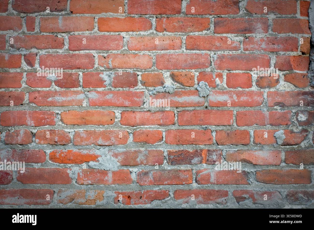 Fond de texture de mur de brique rouge altéré avec détail de mortier Banque D'Images