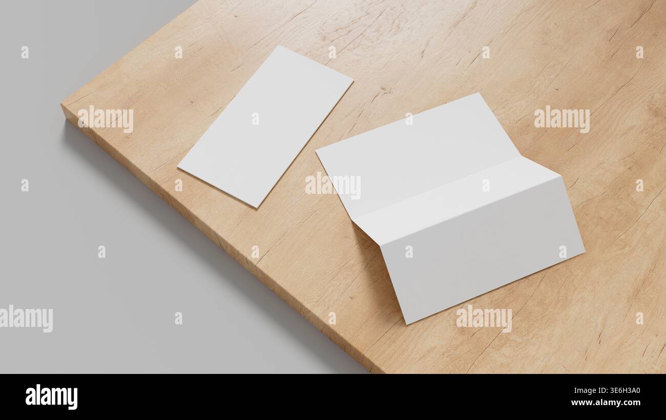 Maquette de brochure professionnelle pliée en trois sur la surface en bois avec une composition minimale adaptée à la conception d'impression de présentation de marque et aux visuels marketing. Banque D'Images