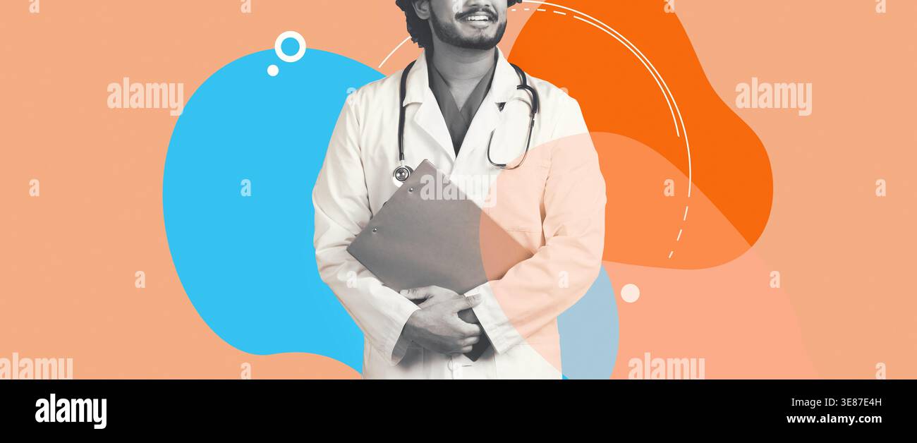 Un beau jeune médecin indien se tient debout avec un dossier médical dans ses mains Banque D'Images