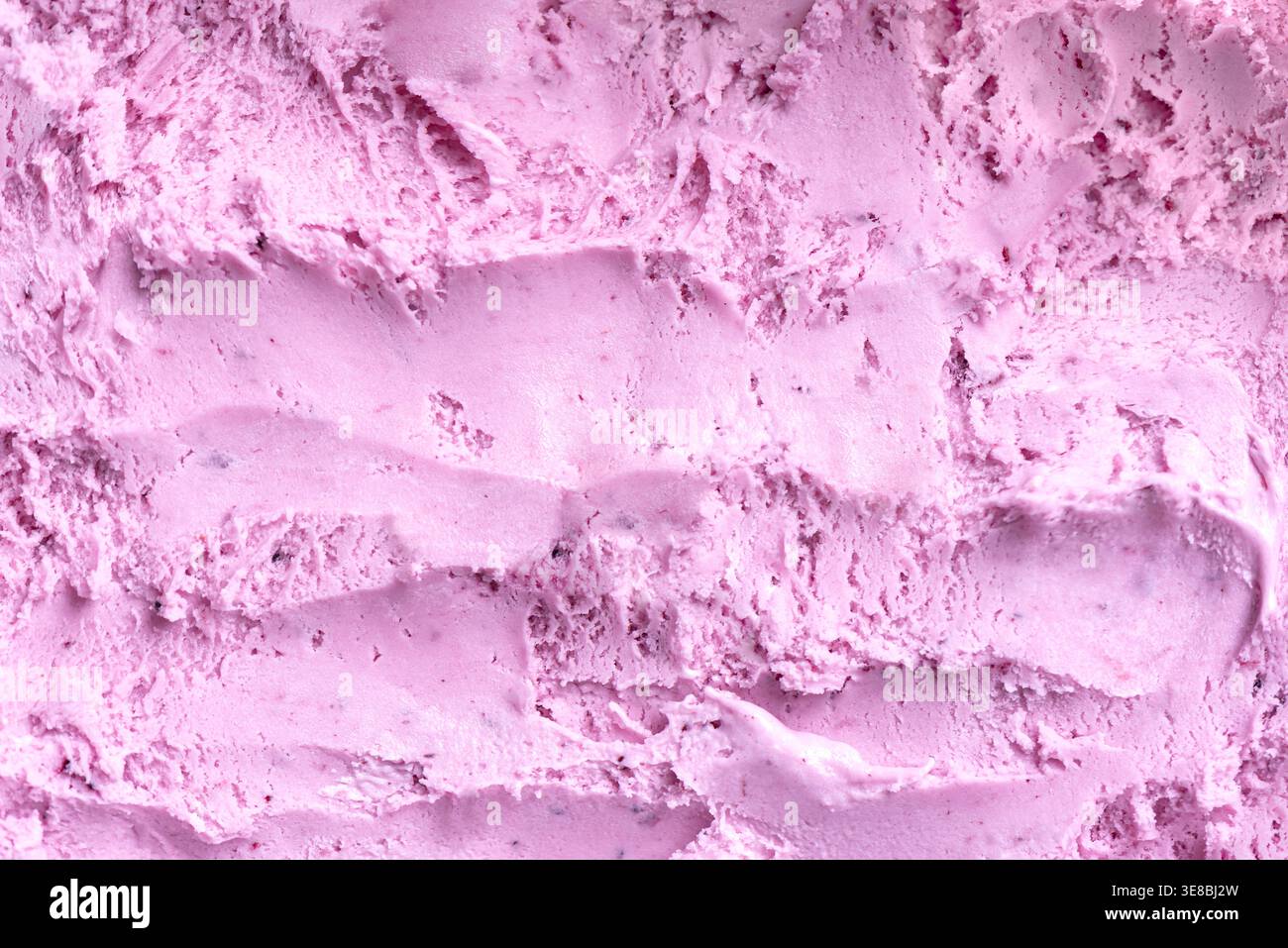Texture de crème glacée bleuet. Glace rose de baies détaillée ou sorbet comme arrière-plan. Banque D'Images
