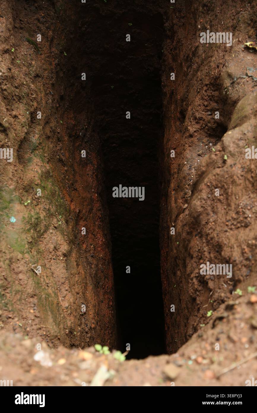 Un des charniers de Kabuga, à Kigali, où des milliers de victimes tutsis ont été jetées vives ou après avoir été massacrées dans le génocide. Banque D'Images