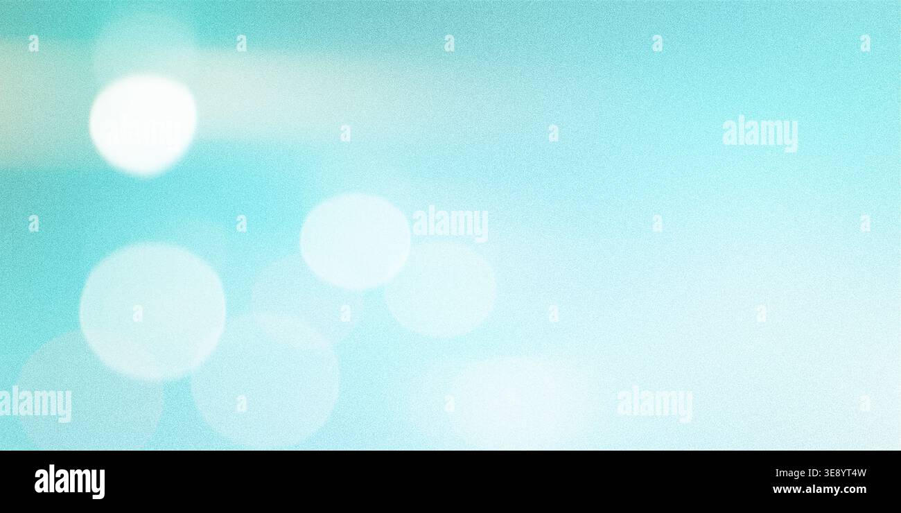 Lumières bokeh abstraites bleues créant un fond doux, rêveur et éthéré avec des couleurs turquoise et sarcelle vibrantes, lumière, dégradé facile Banque D'Images