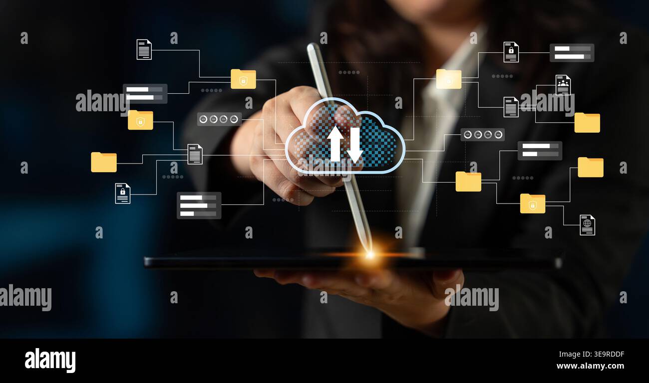 Professional Individual utilise une tablette pour télécharger des données sur le cloud, mettant en valeur la technologie moderne et la connexion numérique dans un bureau dynamique Banque D'Images