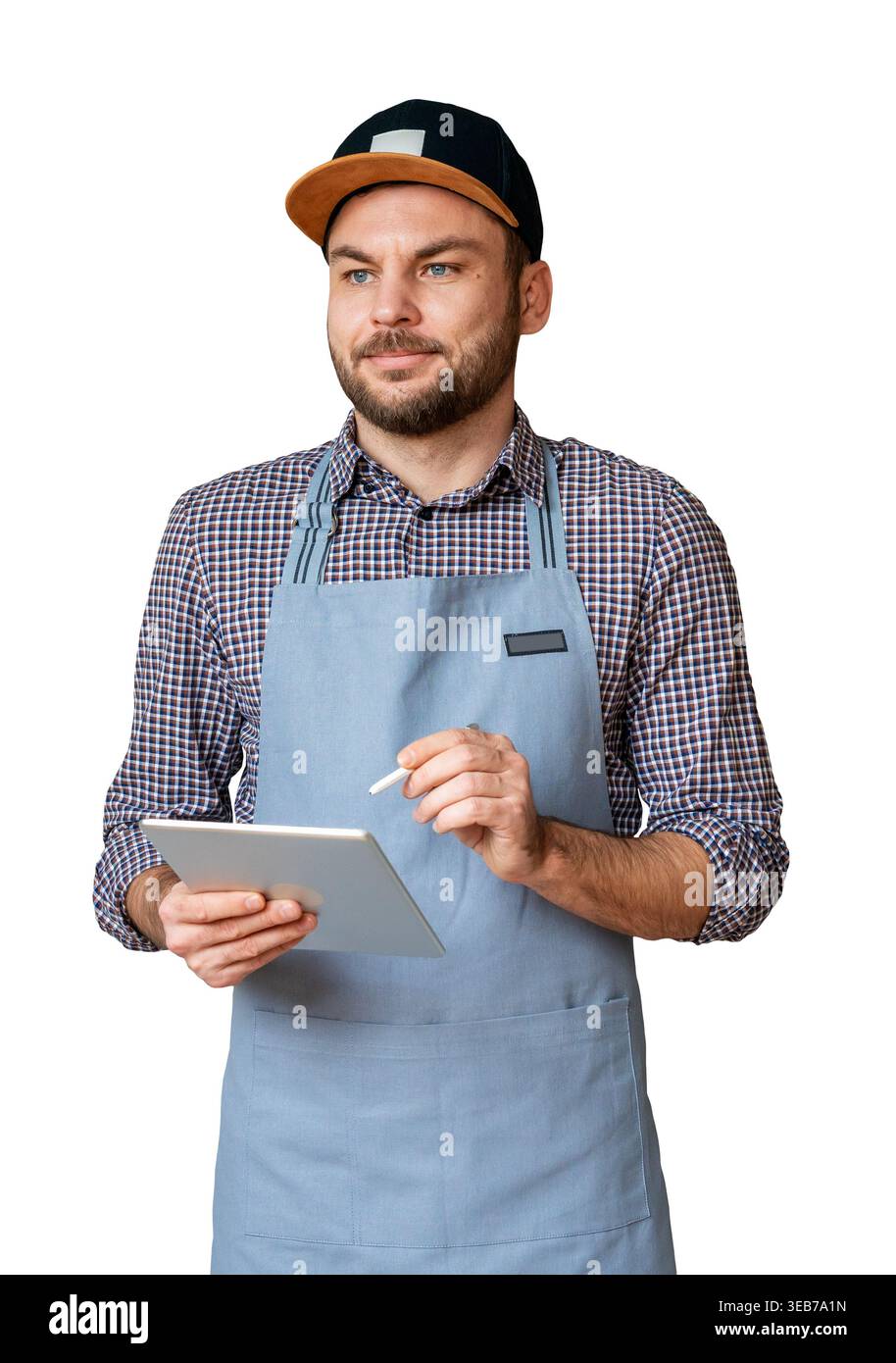 Mâle isolé dans un tablier et une casquette tenant une tablette. Serveur prenant la commande à l'aide d'une tablette numérique. Banque D'Images
