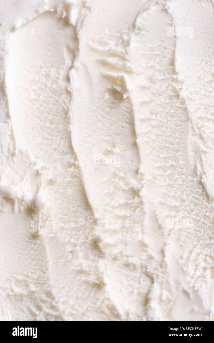 Texture de crème glacée à la vanille blanche détaillée en gros plan. Texture de glace laitière maison. Banque D'Images