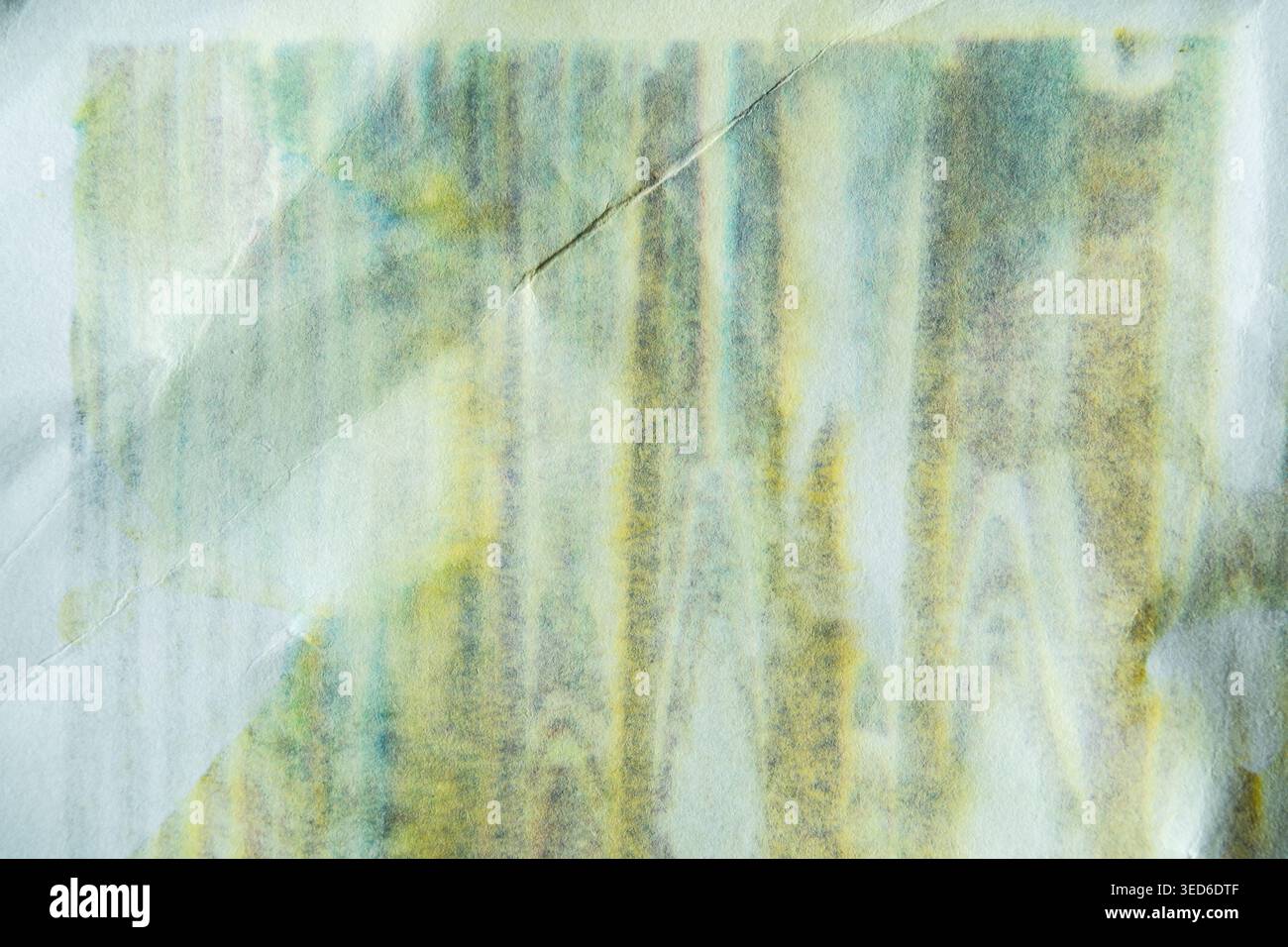 Texture de papier vieilli abstrait avec motifs pailletés d'encre cyan et jaune Banque D'Images