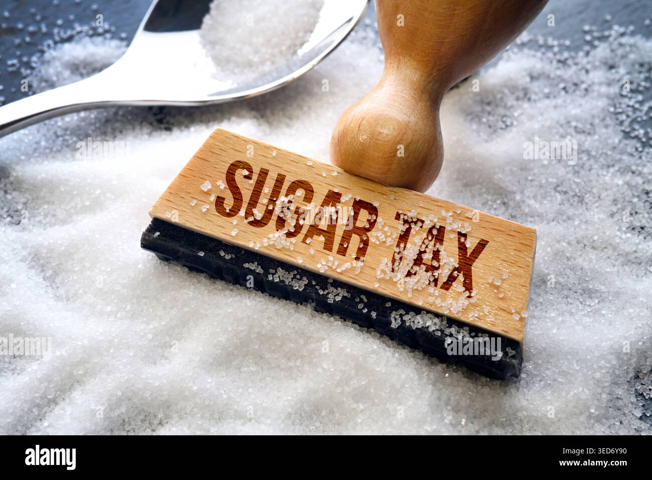 Timbre avec inscription Sugar tax, photomontage Banque D'Images