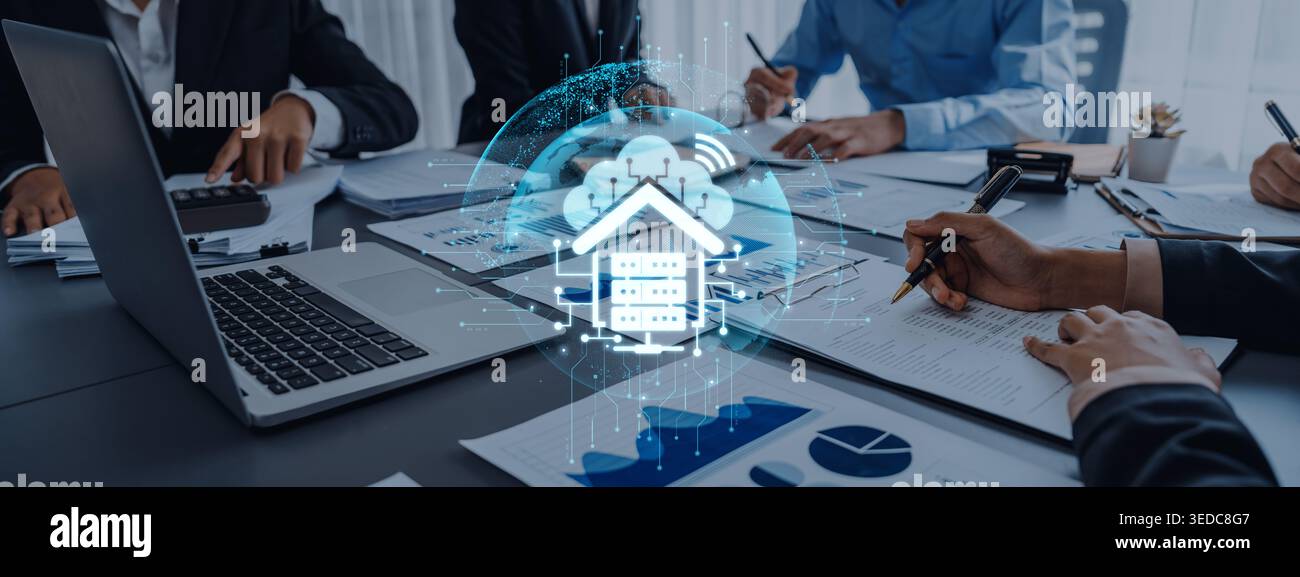 Une réunion d'affaires dynamique mettant en valeur la collaboration et l'interaction technologique, mettant en évidence la visualisation des données avec une icône de serveur, symbolisant Banque D'Images