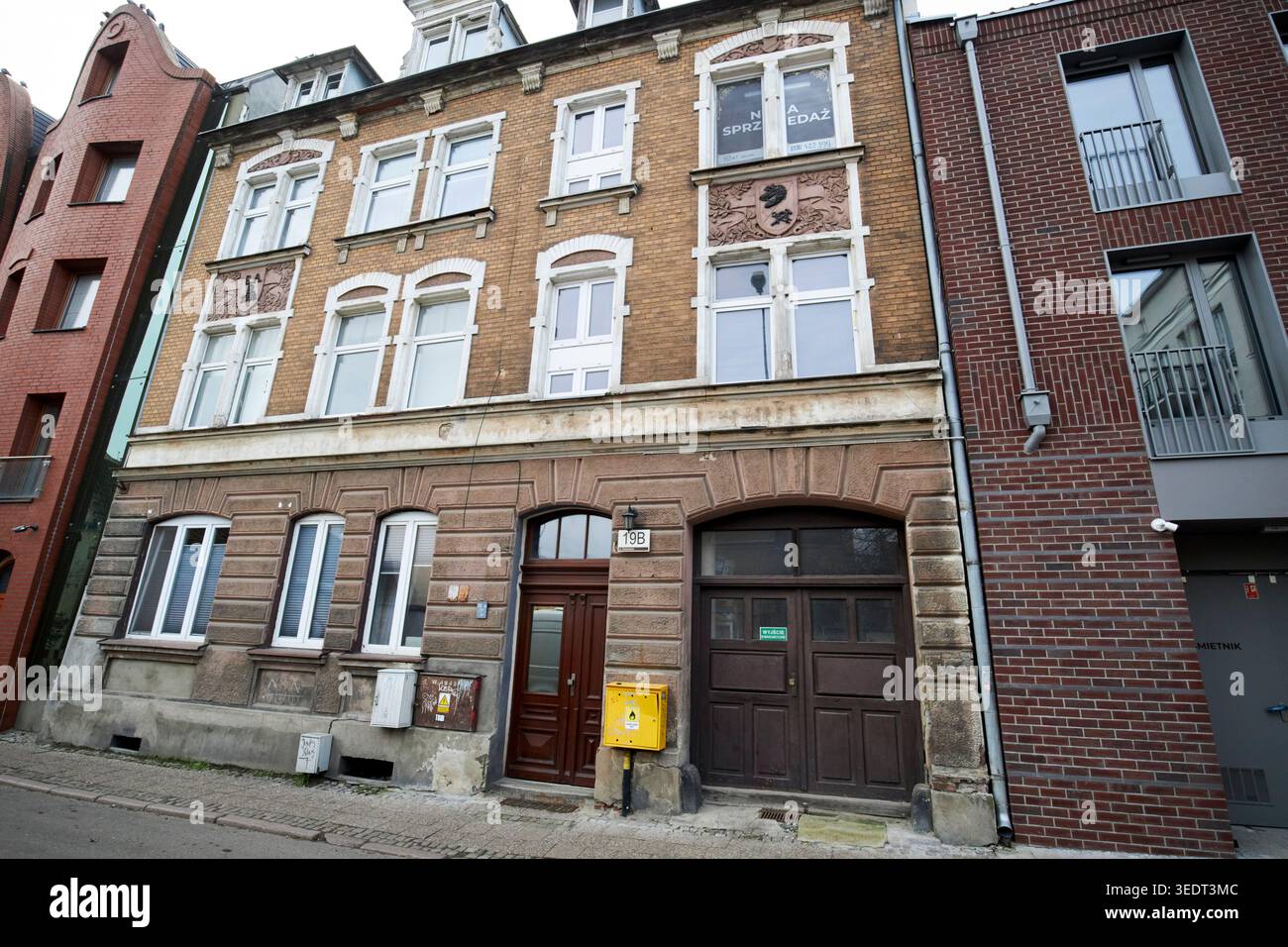 19b bâtiment sukiennicza avec libellé allemand fané sur le panneau d'avant-guerre danzig gdansk pologne construit en 1900 Banque D'Images