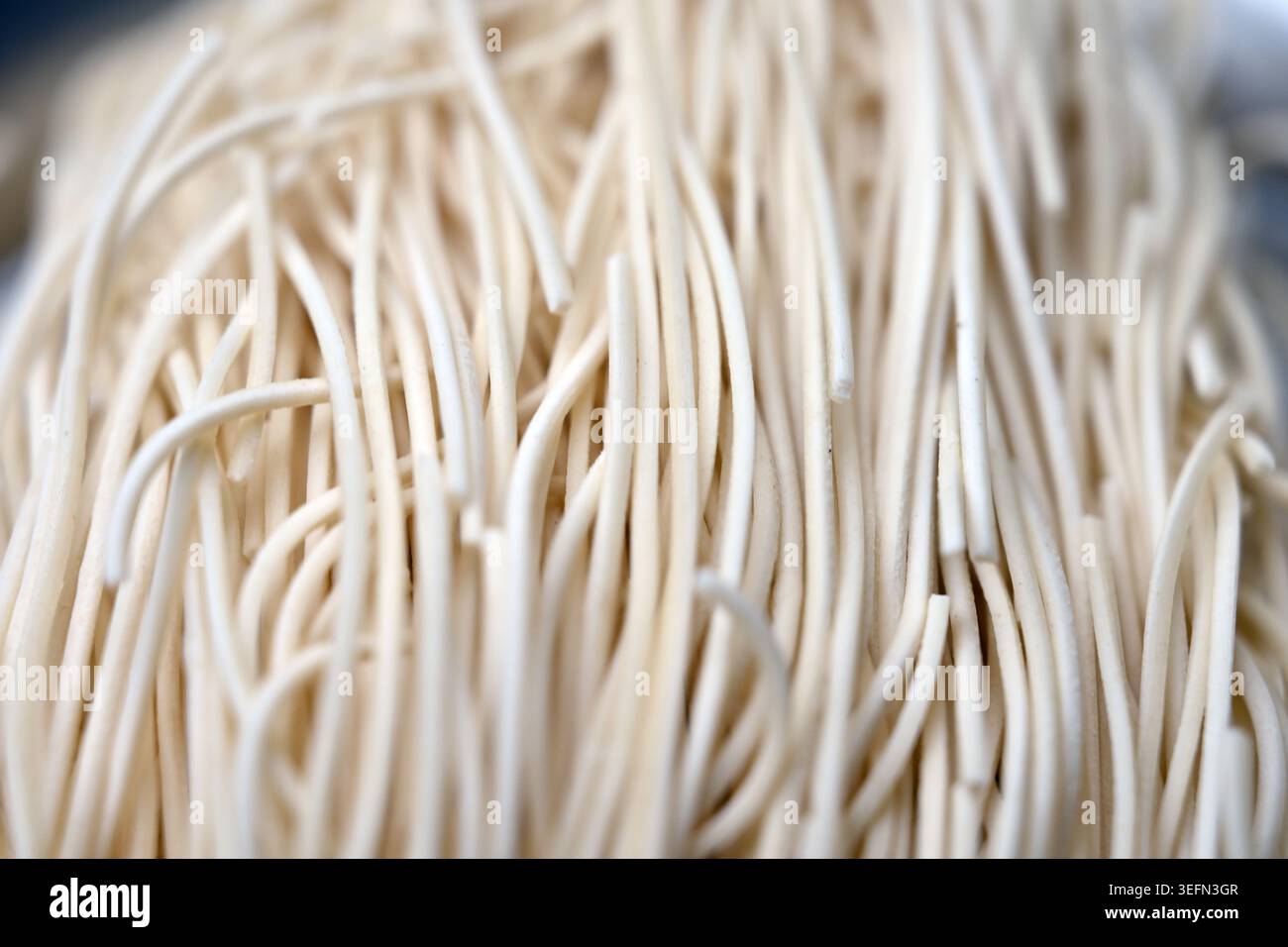Texture de nouilles brutes avec arrière-plans flou Macro photographie Banque D'Images