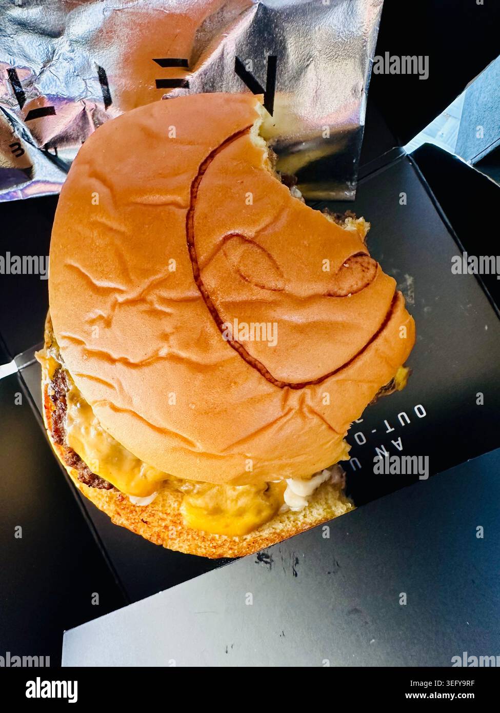 Emballage Alien Burger Fast Food Banque D'Images