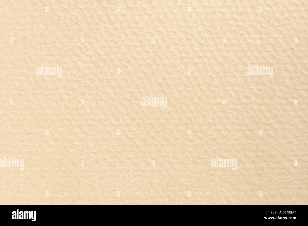 Fond abstrait d'un carton texturé brun formant un motif répétitif. Plein format Banque D'Images