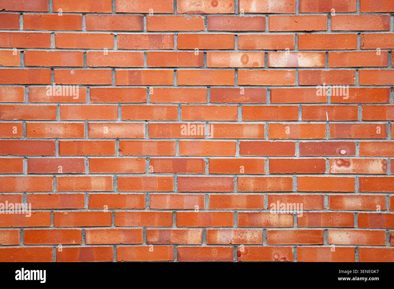 Fond en brique rouge avec beaucoup d'espace pour du texte. Banque D'Images