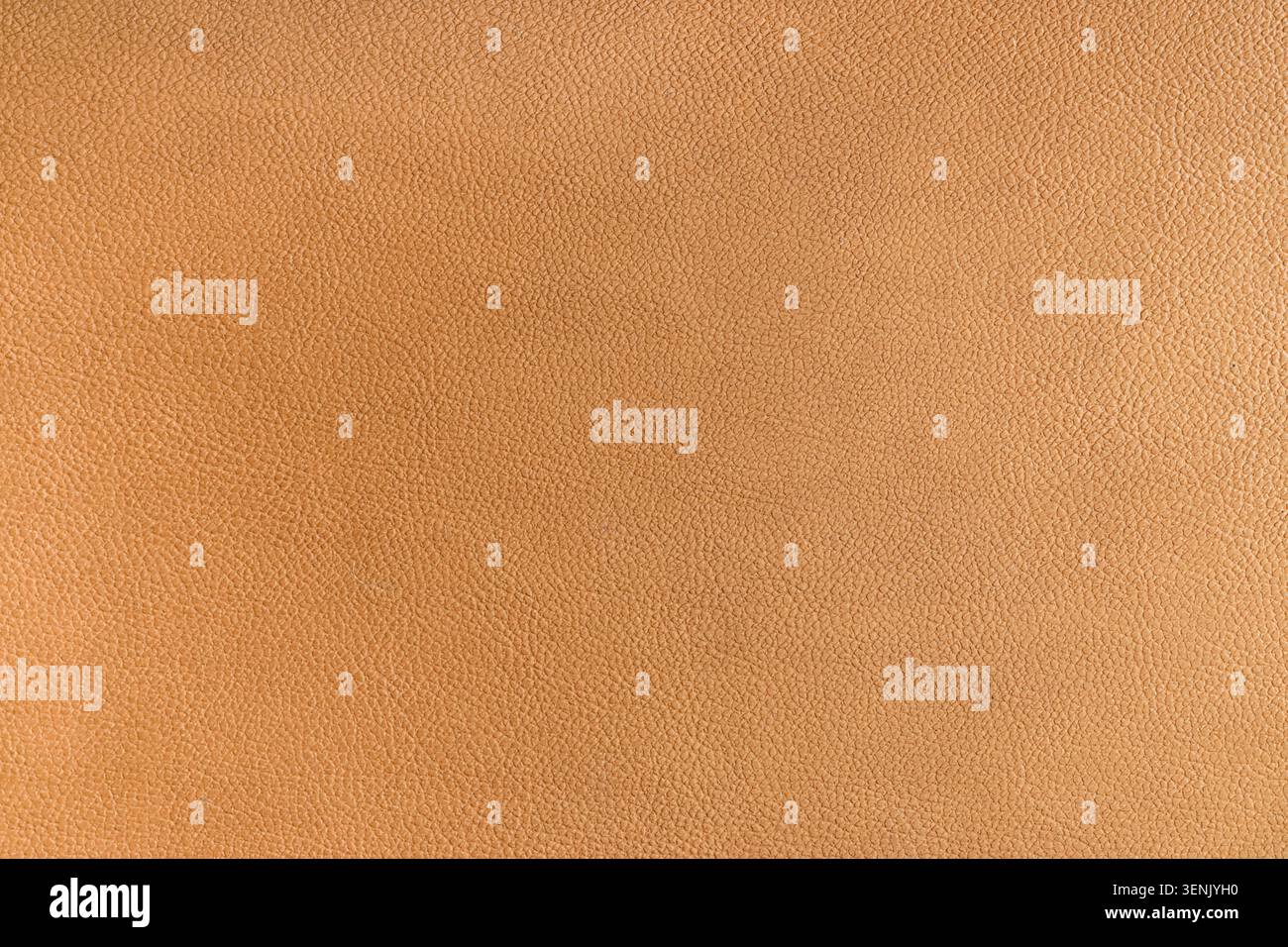 Fond de texture en cuir bronzé naturel avec détail de grain fin, matériau durable pour la conception de la mode et du rembourrage Banque D'Images
