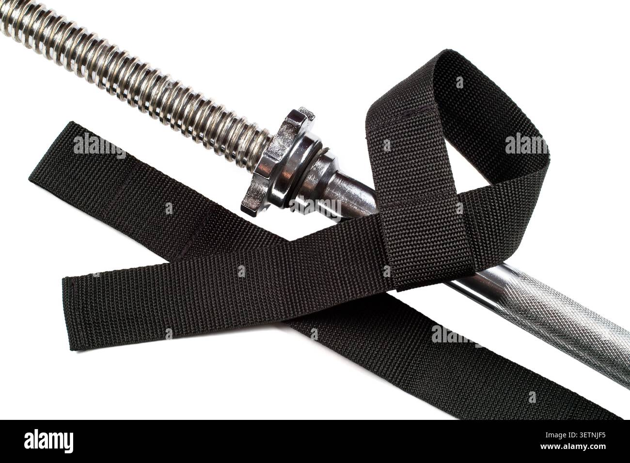 Dragonnes pour soulevé de terre. Ceintures de sport avec une barre sur un fond blanc. Accessoires de sport en gros plan. Banque D'Images
