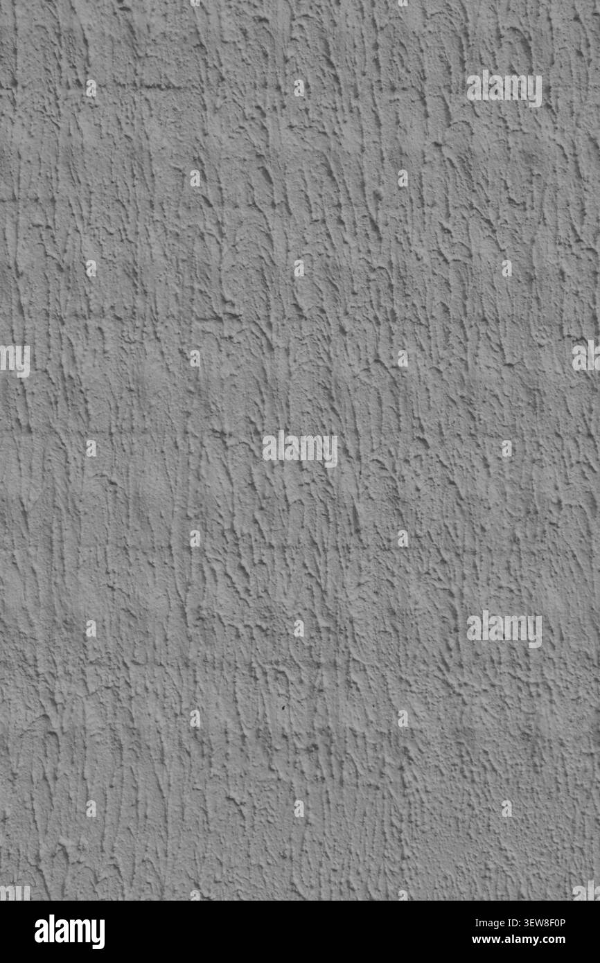 Fond de surface murale en plâtre texturé gris haute résolution. Motif vertical abstrait de stuc décoratif de coléoptère de l'écorce, idéal pour l'intérieur moderne d Banque D'Images