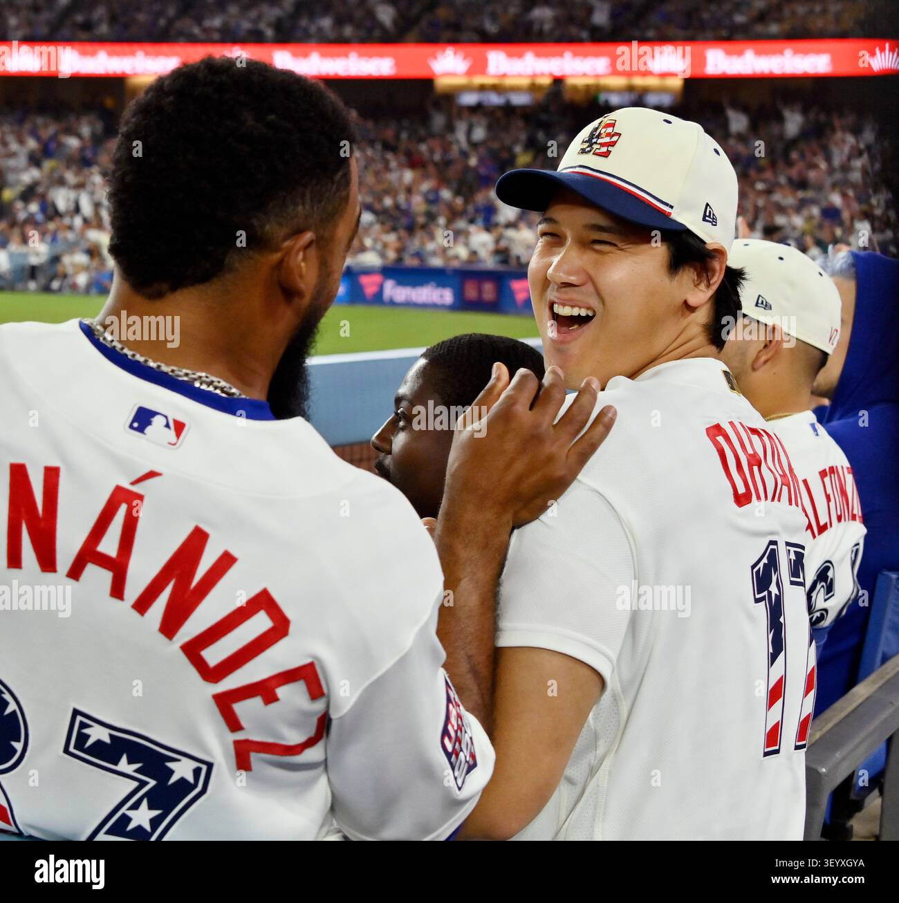 Los Angeles, United States. 04th July, 2026. Los Angeles Dodgers Shohei Ohtani shares a light moment with Teoscar Hernandez in the dugout during the ninth inning against the San Diego Padres at Dodger Stadium in Los Angeles on Saturday, July 4, 2026. Photo by Jim Ruymen/UPI Credit: UPI/Alamy Live News Banque D'Images