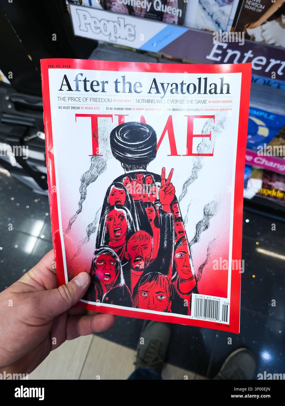 CHICAGO, il, États-Unis - 20 JANVIER 2026 : Person tient le magazine TIME avec le titre de couverture "après l'Ayatollah" avec une illustration rouge et noire. HEURE Banque D'Images