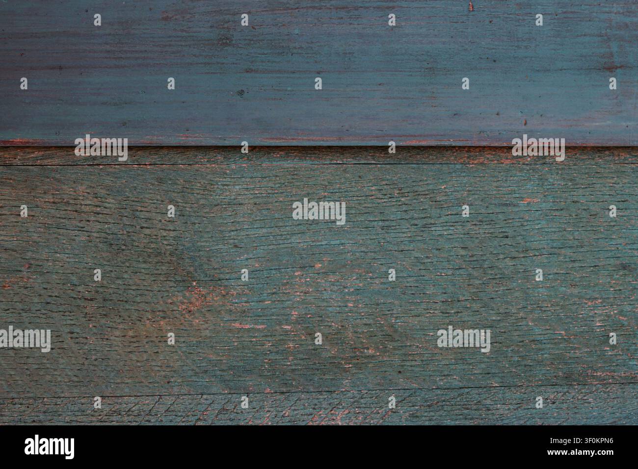 Texture de fond horizontale de vieilles planches en bois peintes en bleu présentant des veines naturelles, une surface de bois usée et des détails vintage rustiques. Banque D'Images