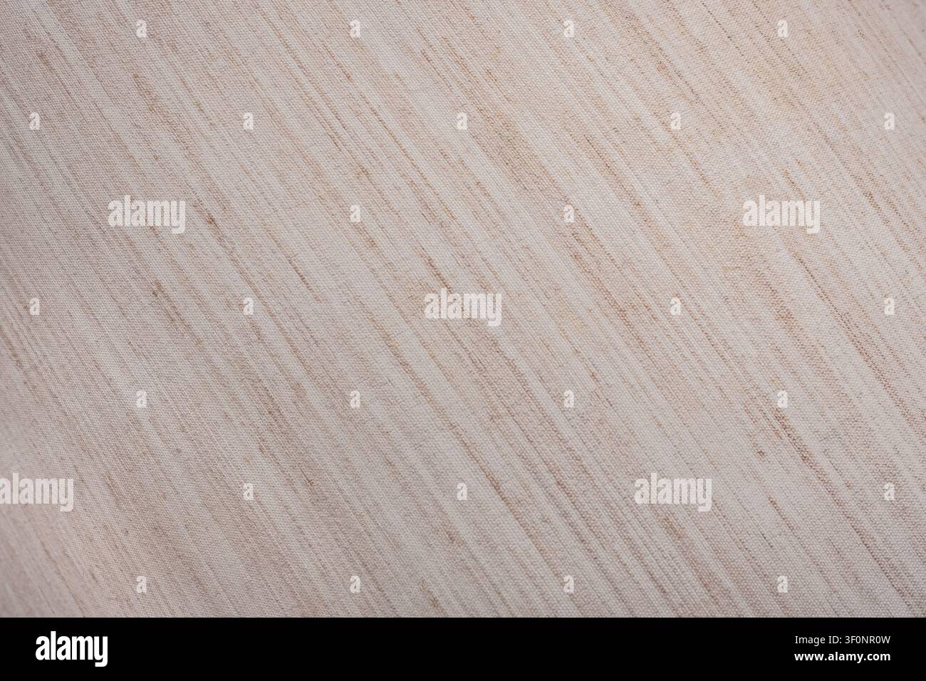 Texture en tissu beige. Un fond beige avec un motif de lignes. Banque D'Images