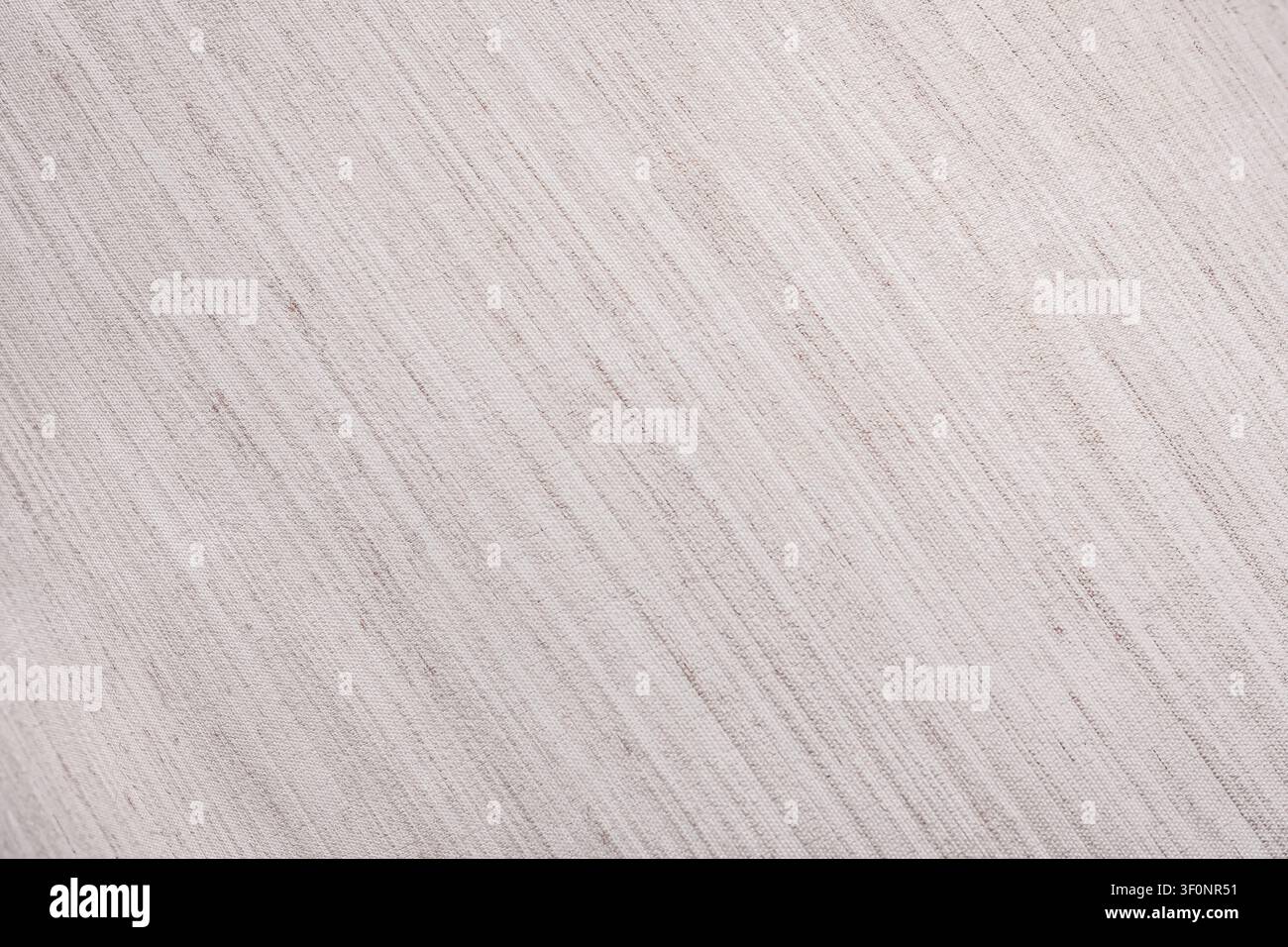 Texture en tissu beige. Un fond beige avec un motif de lignes. Banque D'Images