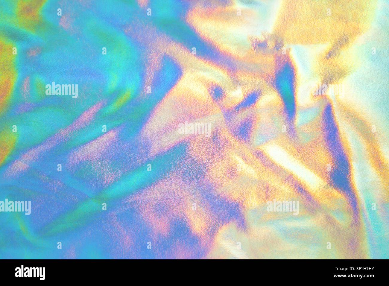 Texture de feuille holographique irisé avec un éclat arc-en-ciel pastel et une surface scintillante abstraite Banque D'Images