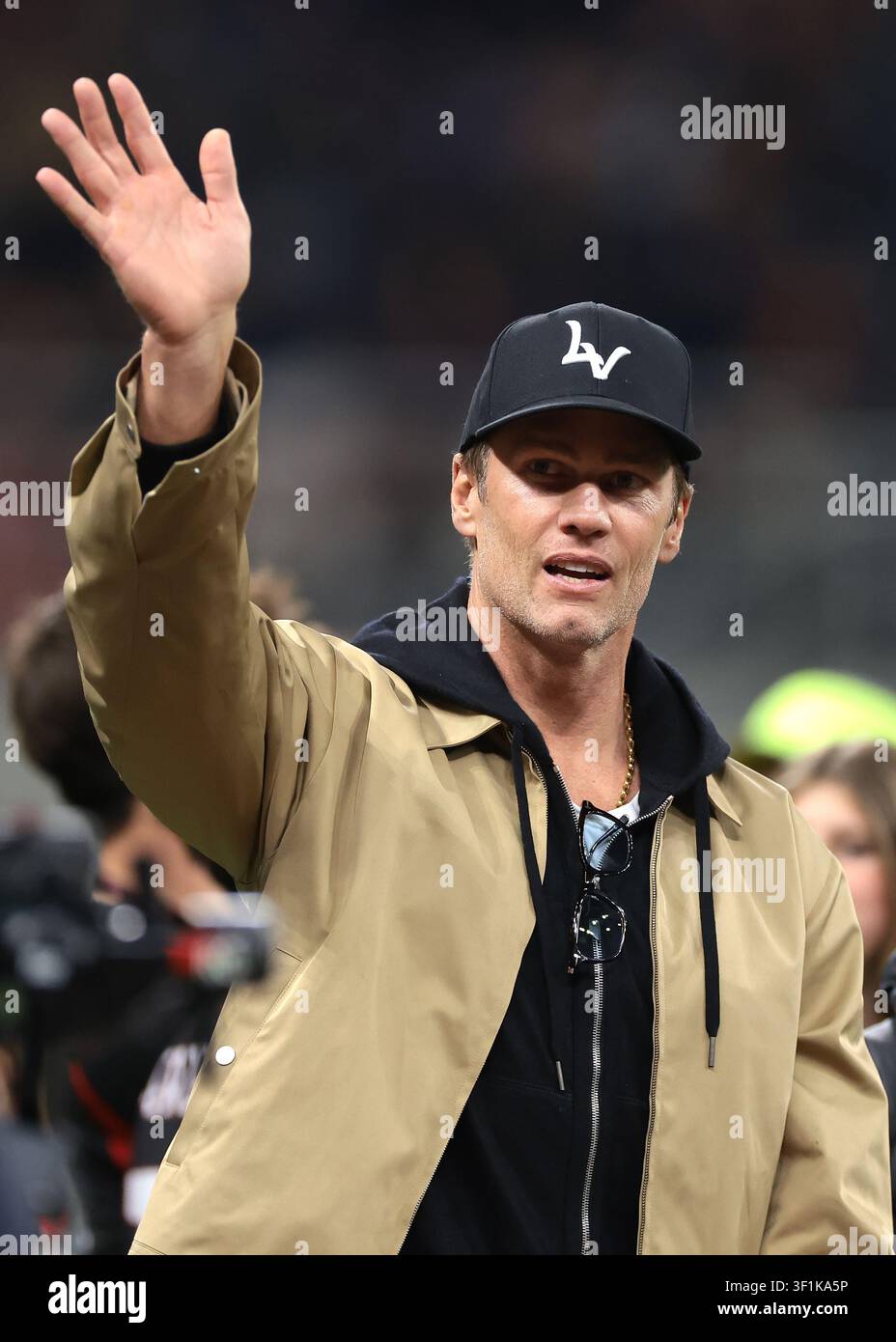 Ancien quarterback de football américain de la NFL, Tom Brady, avant le match. Banque D'Images