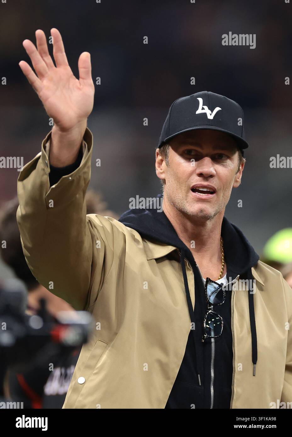 Ancien quarterback de football américain de la NFL, Tom Brady, avant le match. Banque D'Images