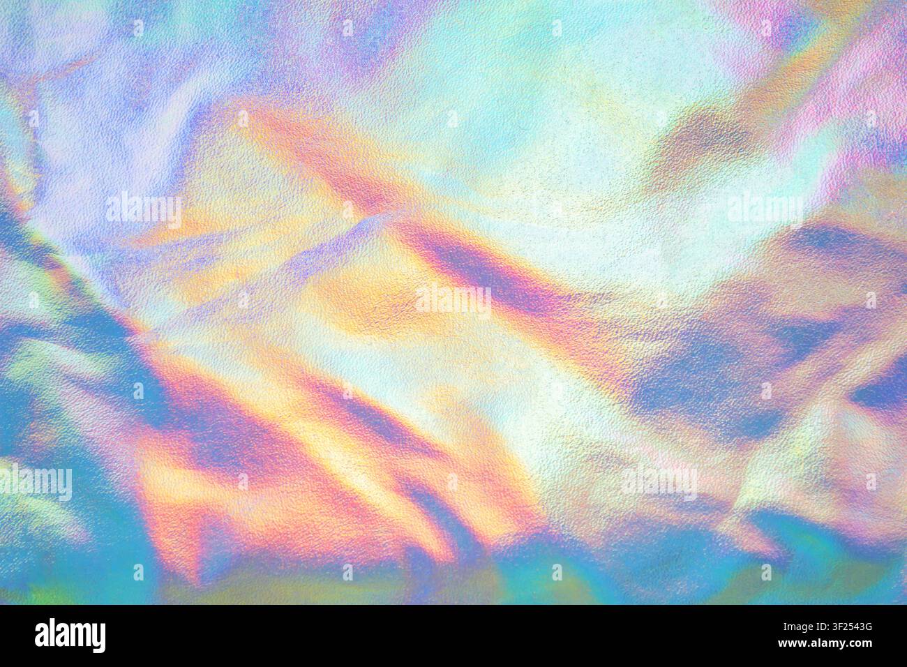 Fond texturé pastel irisé holographique avec feuille métallique scintillante et effet froissé Banque D'Images